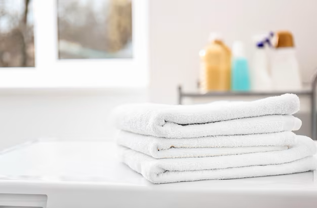 Stack clean towels washing machine laundromat